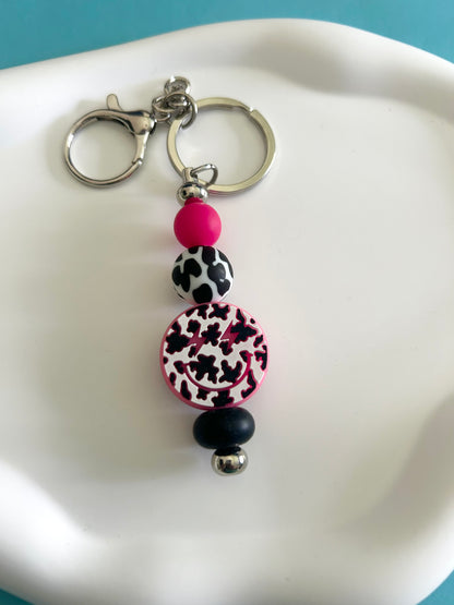 Cow Print Smiley Keychain