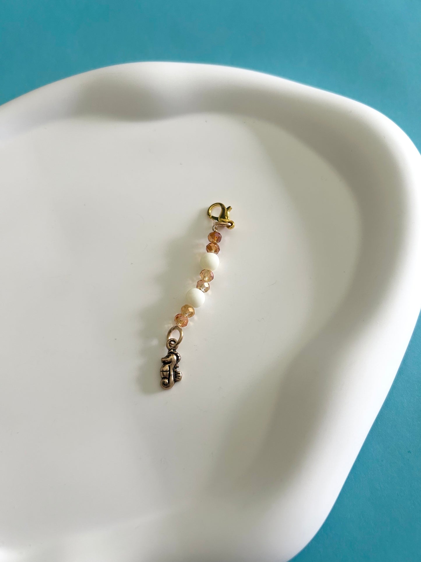 Seahorse Dust Plug Charm