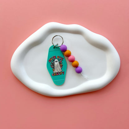 Cute But Creepy Keychain