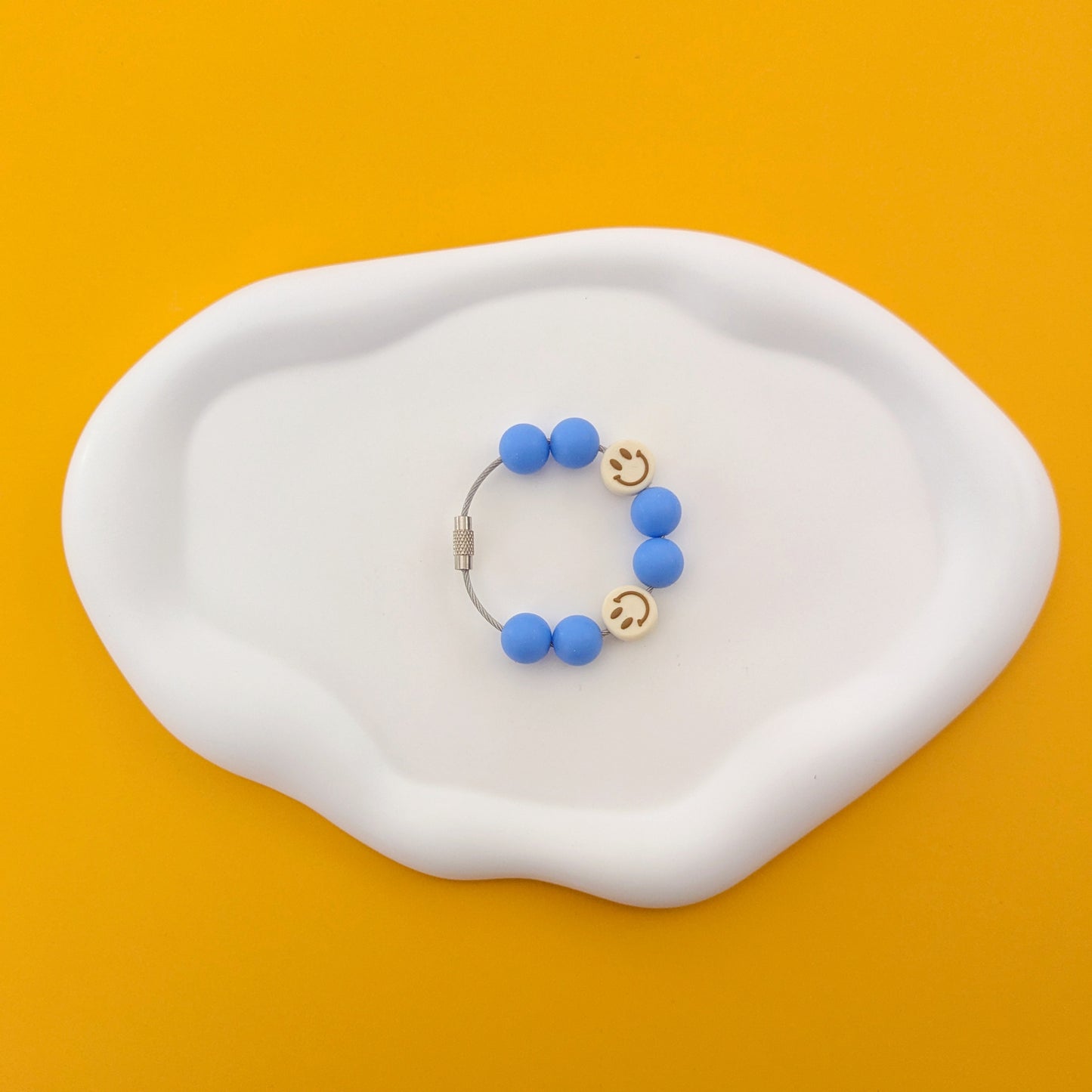 Blue with Cream Happy Faces Cup Handle Charm