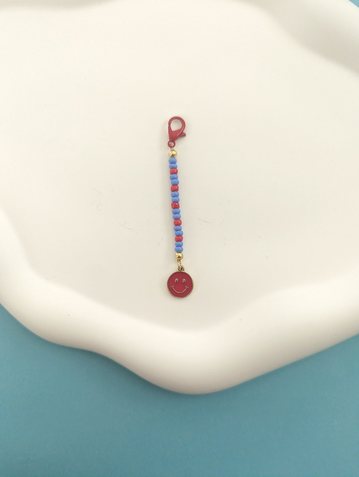 Red Happy Face Dust Plug Charm
