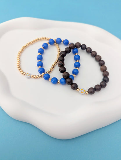 Blue, Gold and Wood Stack