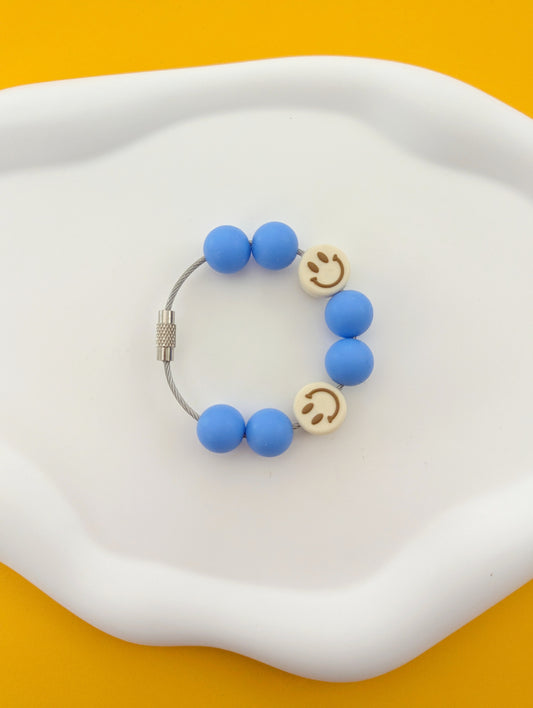 Blue with Cream Happy Faces Cup Handle Charm