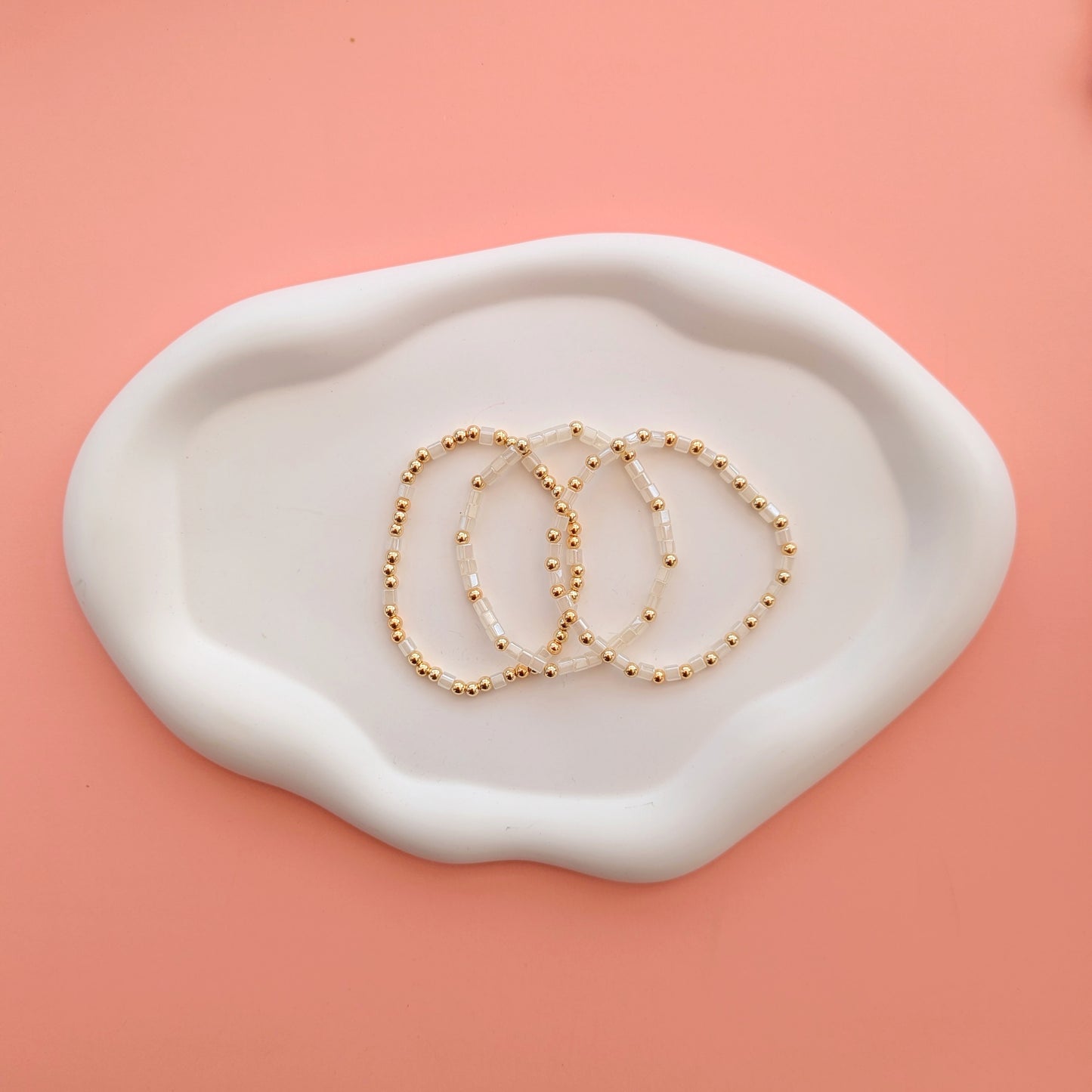 Gold and White Bracelet Stack